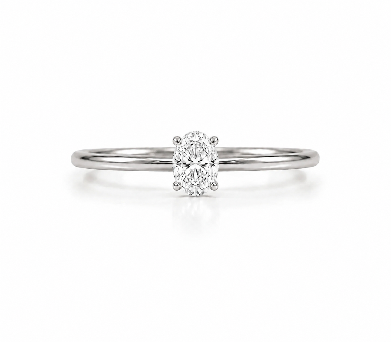 9ct white gold solitaire engagement ring with 0.50ct oval lab grown diamond in four claw setting on polished tapered band