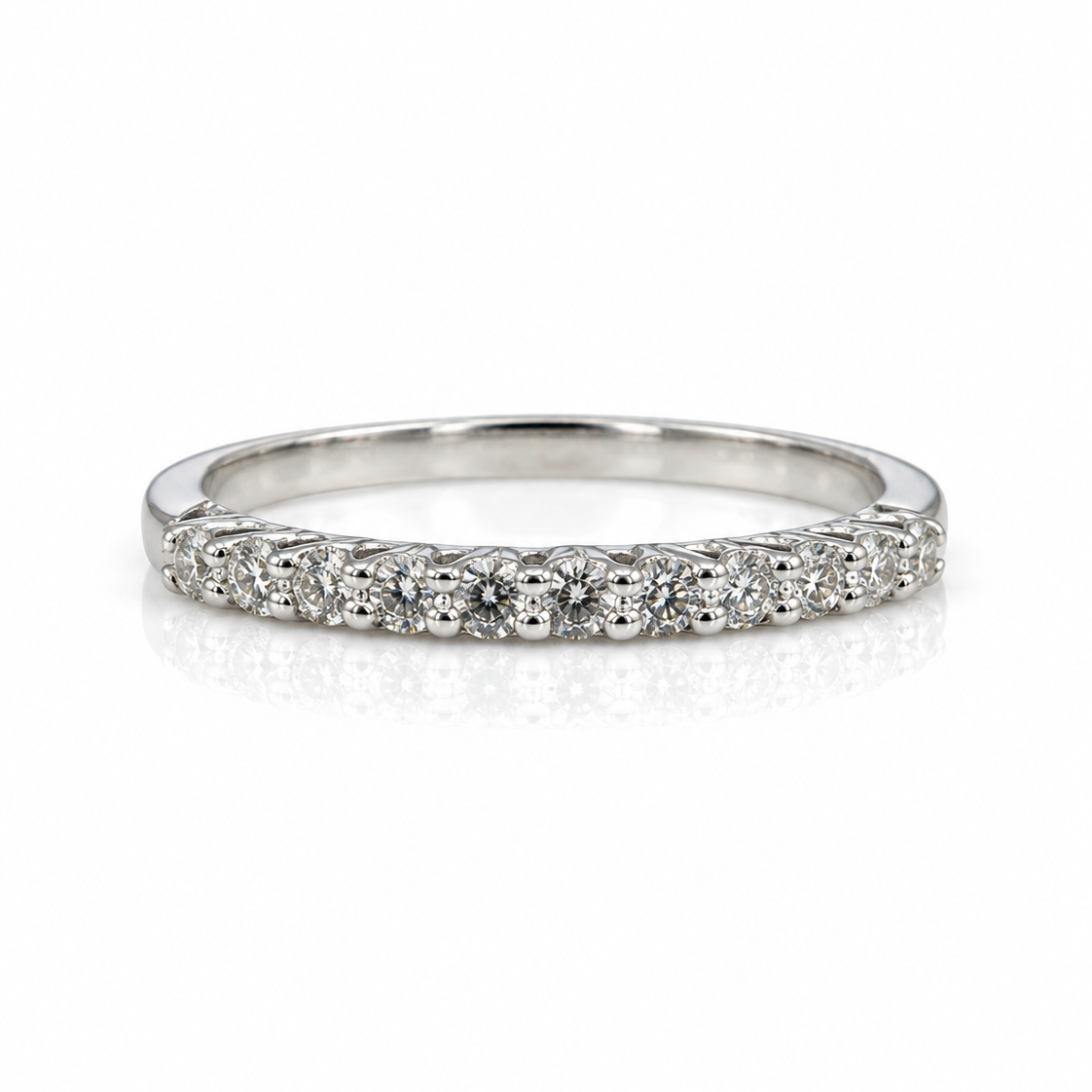 9ct white gold eternity band with 0.25ct lab grown diamonds in claw settings, polished finish, elegant wedding band from Cassims & Co.
