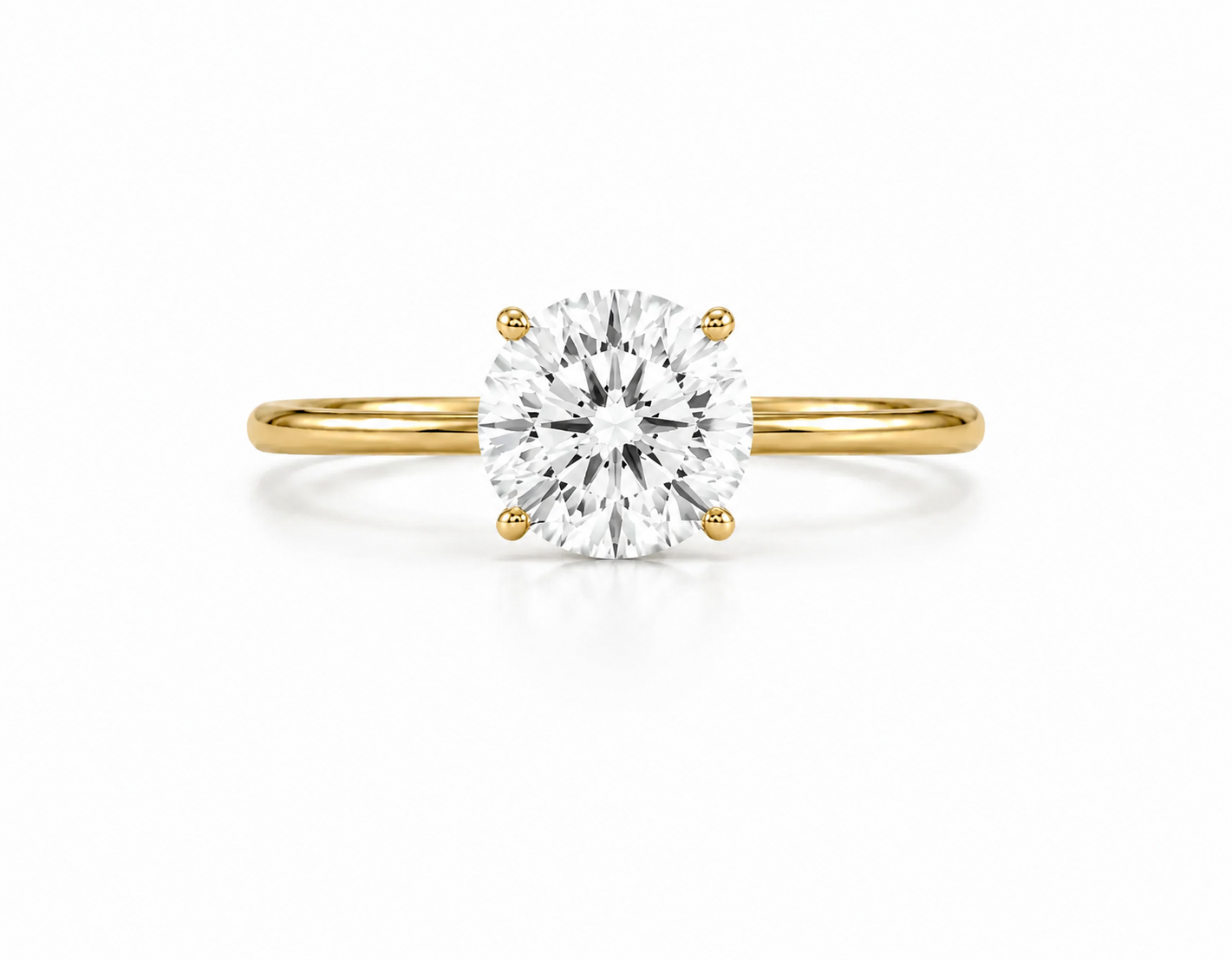 9ct yellow gold engagement ring with 1.5ct round brilliant lab grown diamond in four prong solitaire setting