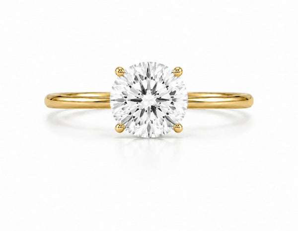 9ct yellow gold solitaire engagement ring with 1.5ct round brilliant lab grown diamond in four-claw setting
