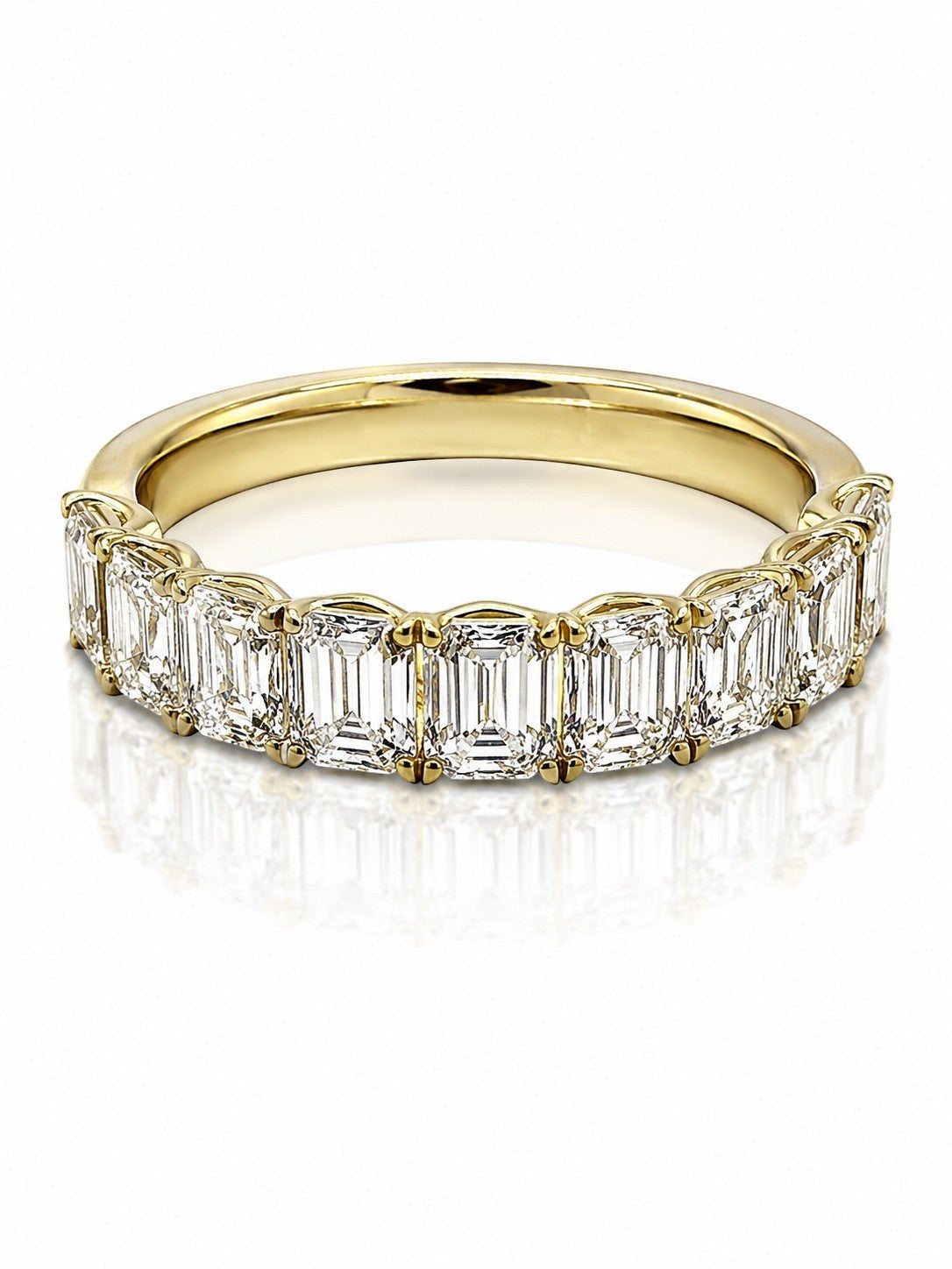 9ct yellow gold eternity band with 2.03ct emerald cut lab grown diamonds in four-prong setting