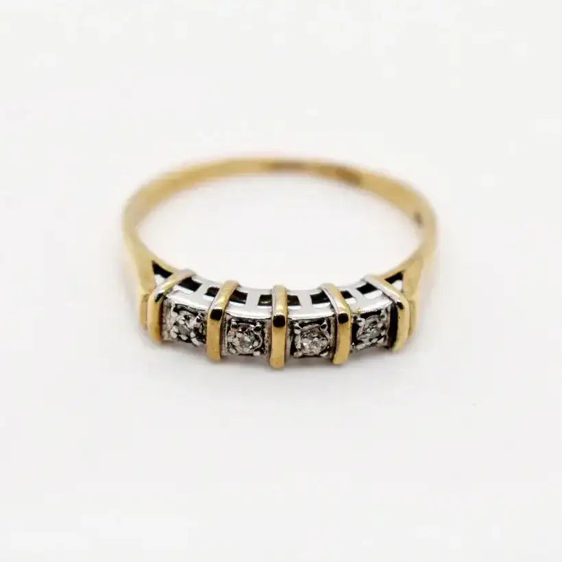 9ct yellow gold four stone diamond ring with bar setting by Cassim & Co Johannesburg