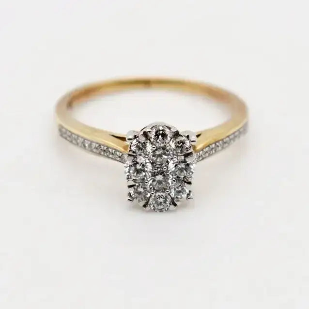 9ct yellow gold diamond cluster engagement ring with round brilliant diamonds in white gold setting