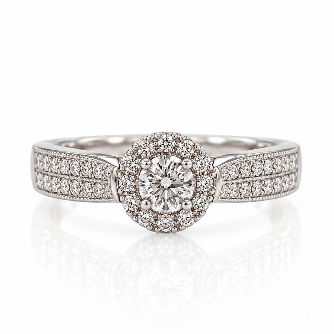 9ct white gold halo engagement ring with round diamond centre and pavé shoulders