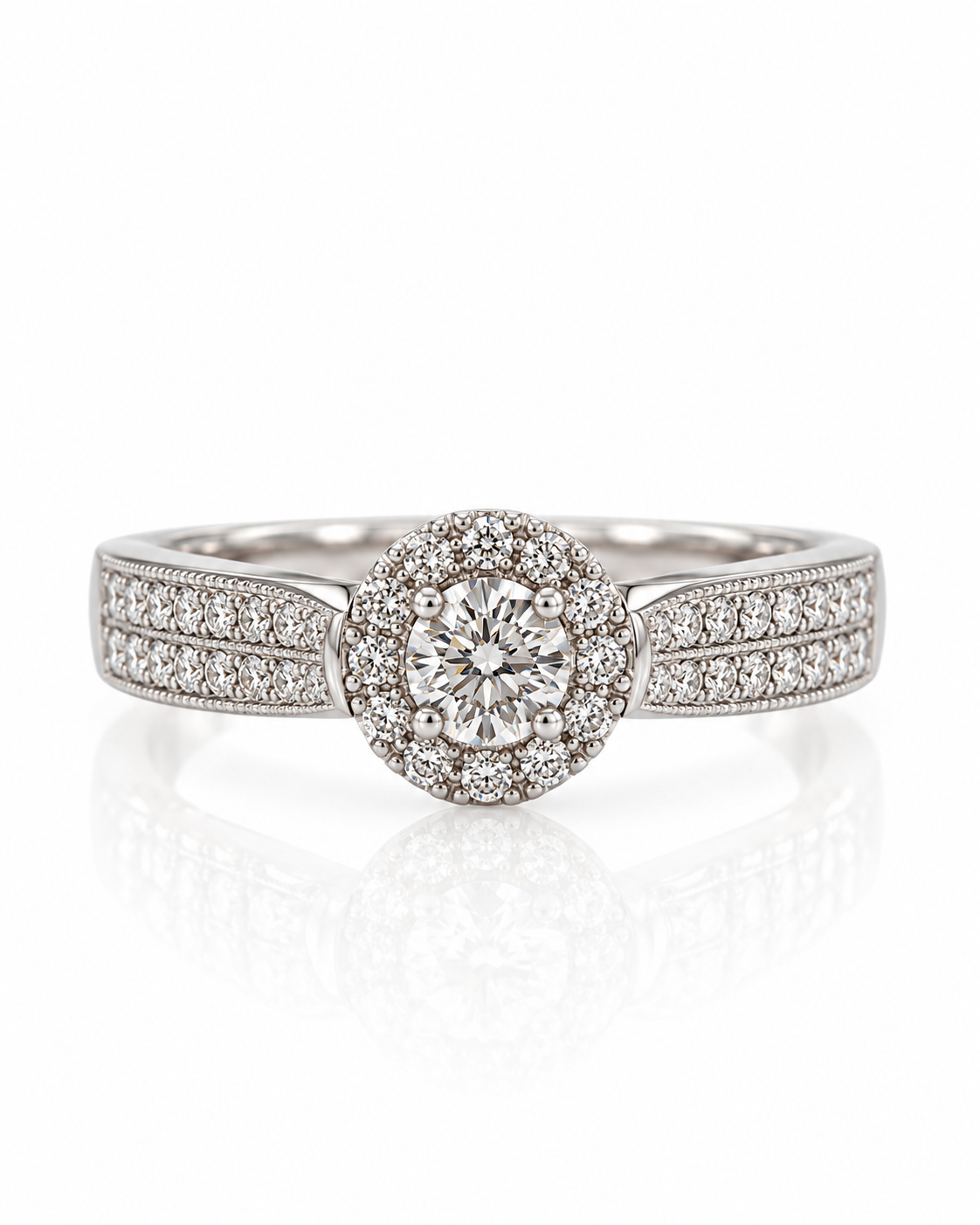 9ct white gold halo engagement ring with round diamond centre and pavé shoulders