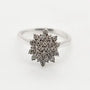 9ct white gold flower diamond cluster ring with brilliant-cut diamonds in floral design setting from Cassim & Co Johannesburg