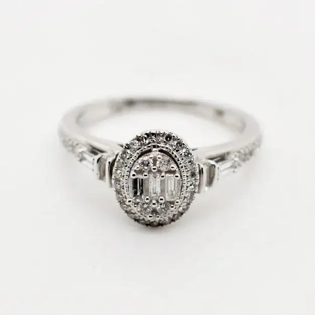 9ct white gold oval baguette diamond halo engagement ring with pavé shoulders by Cassim and Co Johannesburg