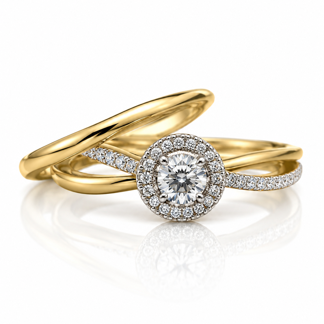 9ct yellow gold halo engagement ring with round diamond and twisted pavé shoulders