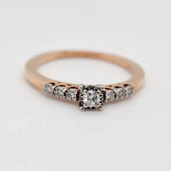 9ct rose gold diamond solitaire engagement ring with pavé shoulders by Cassim & Co Johannesburg