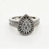 9ct white gold teardrop diamond halo ring with baguette and round brilliant diamonds on split shank band by Cassim & Co Johannesburg