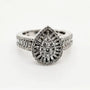 9ct white gold teardrop diamond halo ring with baguette and round brilliant diamonds on split shank band by Cassim & Co Johannesburg
