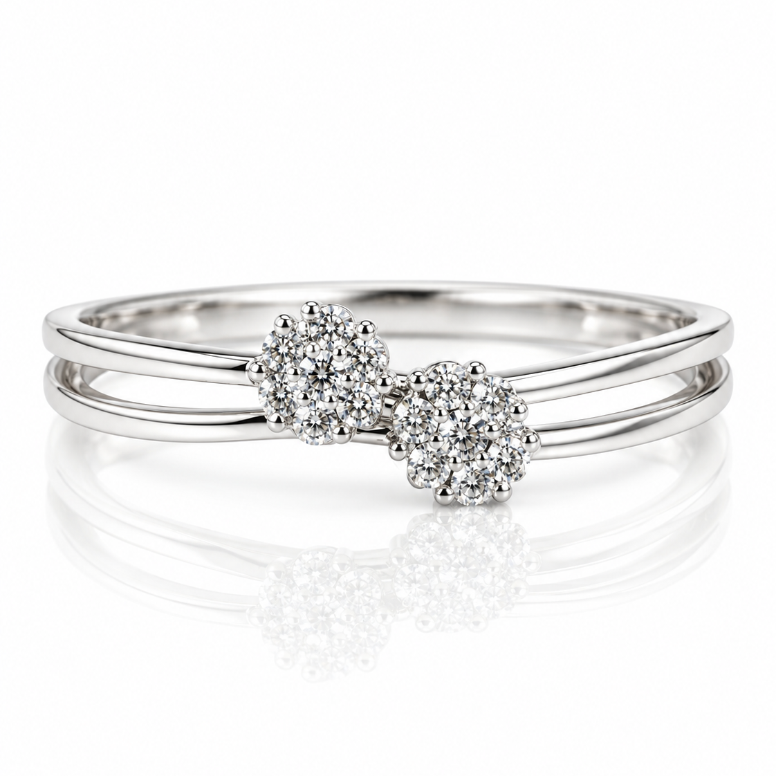 9ct white gold dress ring with two flower-shaped round diamond clusters on a split shank