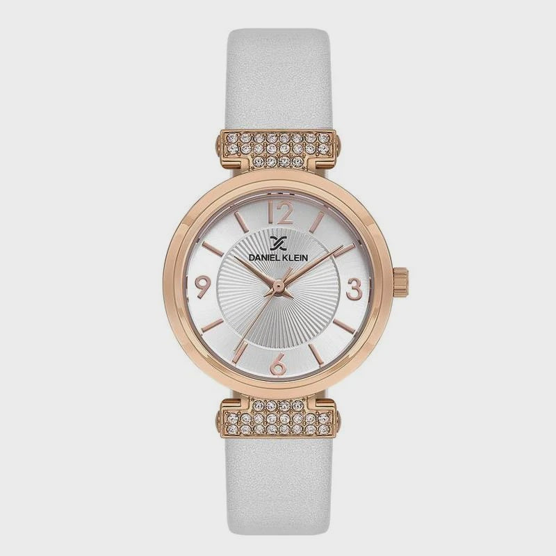 Daniel Klein Premium DK.1.13967-6 ladies' watch with rose gold case, silver sunray dial, crystal-embellished lugs, and white genuine leather strap