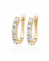 9ct yellow gold huggie hoop earrings set with 1.00 carat of brilliant-cut lab-grown diamonds in claw settings