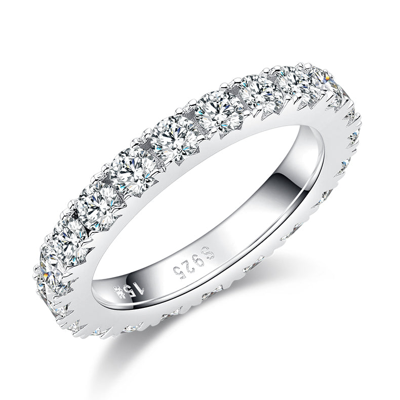 Sterling silver full eternity moissanite ring with round brilliant cut stones in prong setting