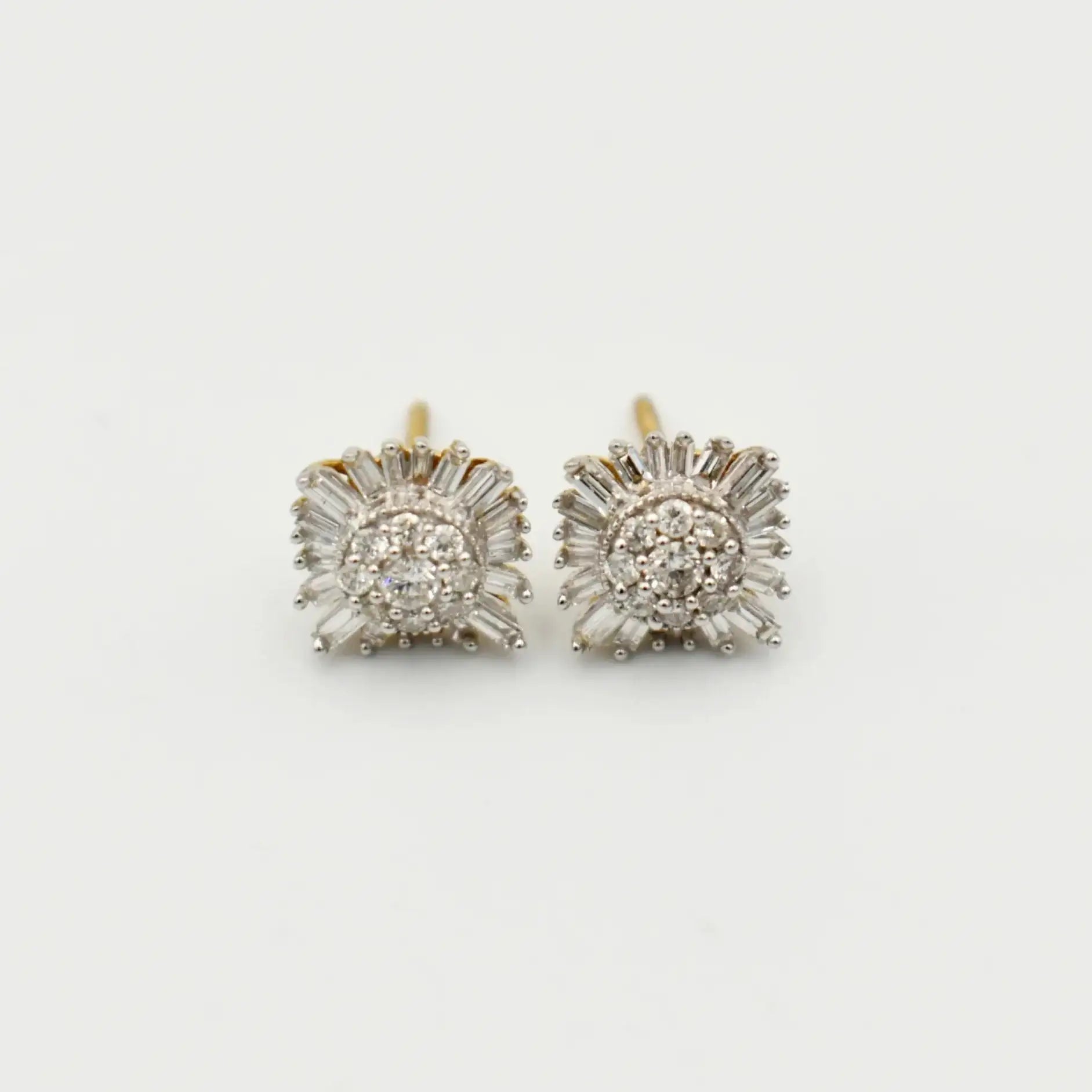 9ct yellow gold diamond starburst earrings with 0.75 carat round brilliant and baguette cut diamonds in cluster setting