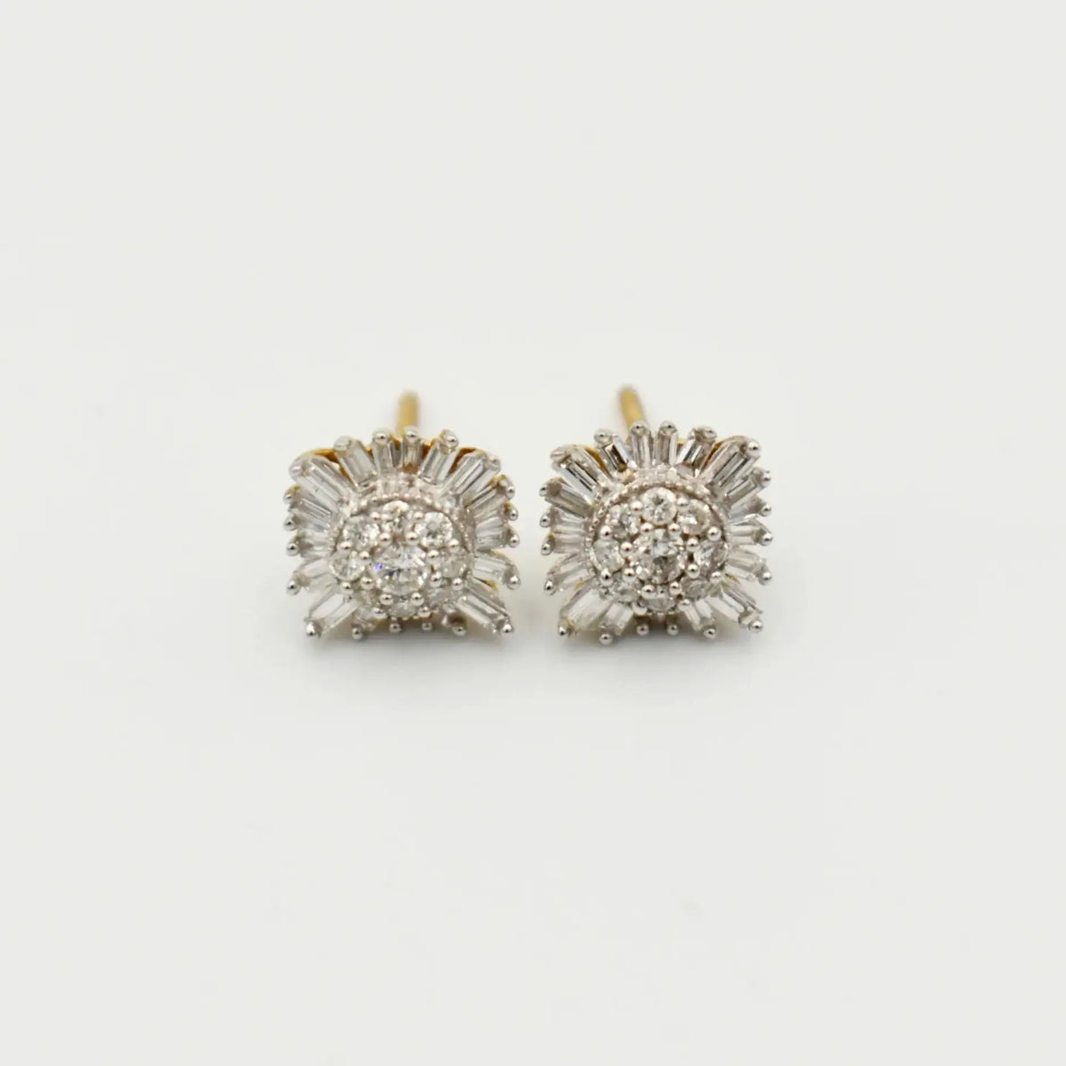 9ct yellow gold diamond starburst earrings with 0.75 carat round brilliant and baguette cut diamonds in cluster setting