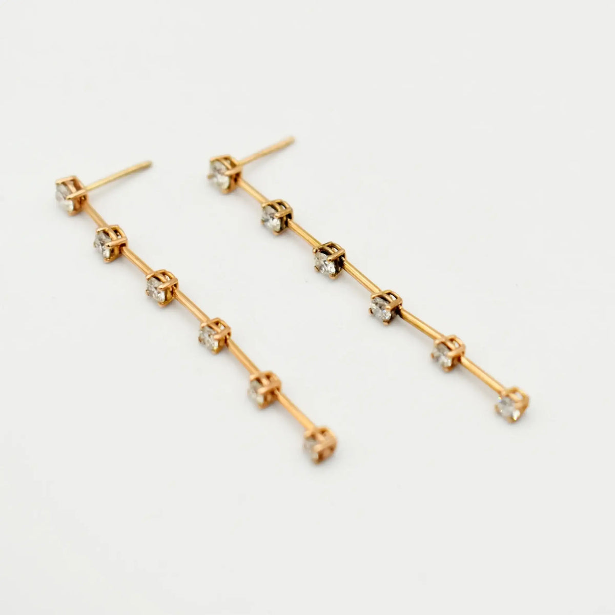 18ct rose gold drop diamond earrings with 1.33ct diamonds in bar setting handcrafted by Cassim & Co Johannesburg