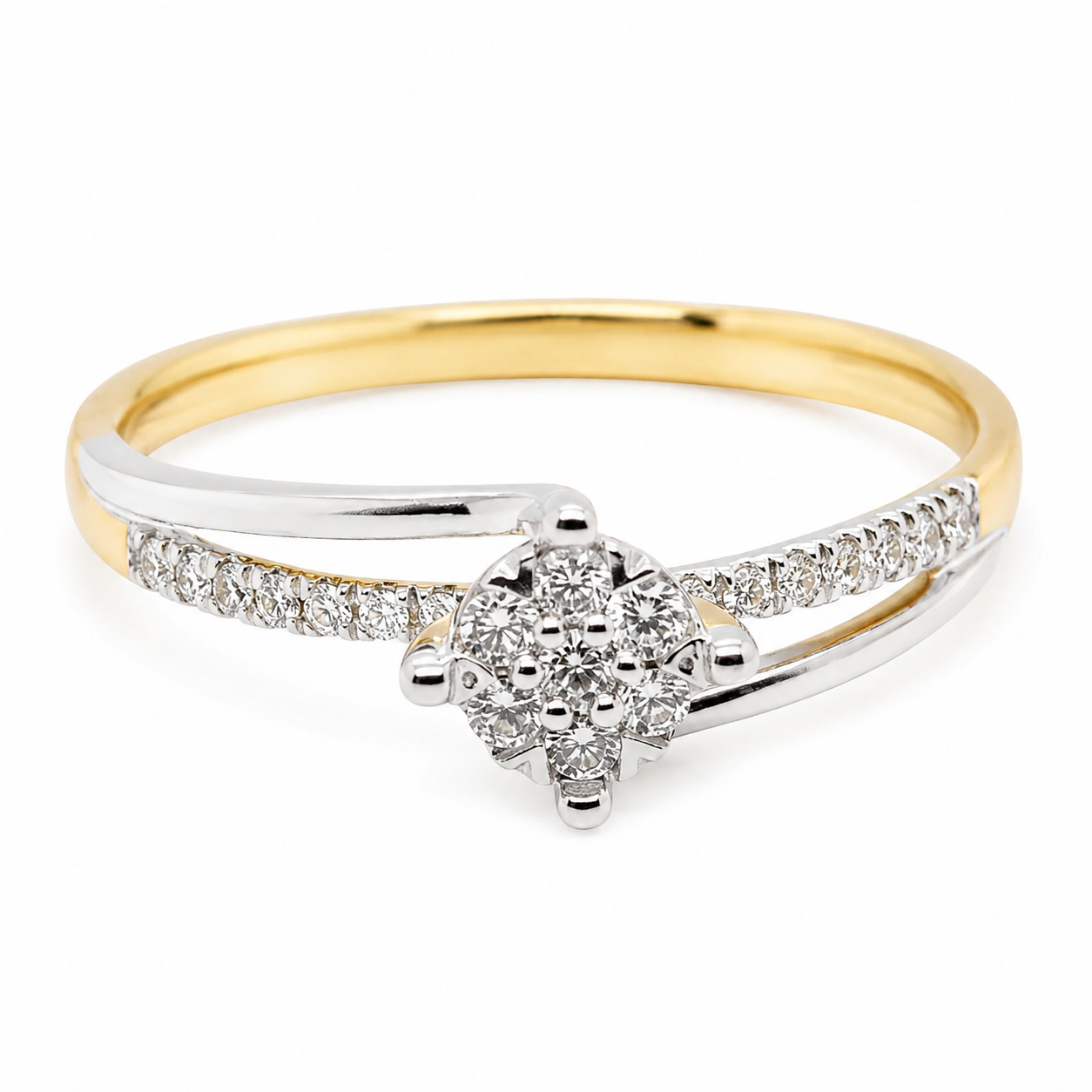 9ct two-tone yellow and white gold diamond cluster engagement ring with bypass band and pavé shoulders by Cassim & Co
