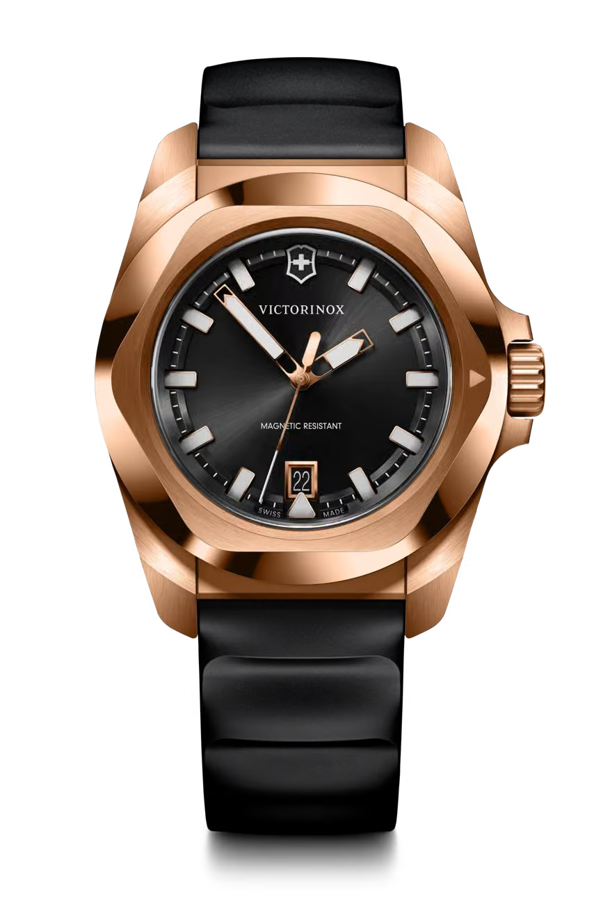 Victorinox I.N.O.X. Mechanical 43mm cushion rose gold PVD automatic watch with black dial, rubber strap, and exhibition caseback