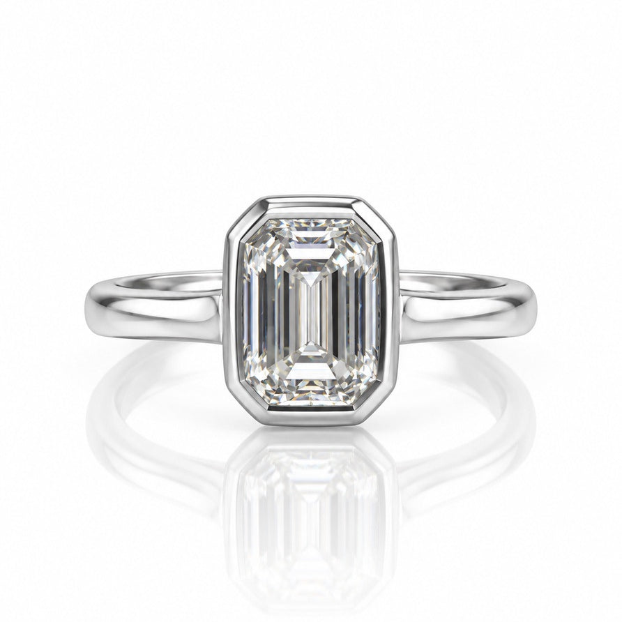 9ct white gold bezel solitaire ring with a 1.00ct emerald cut lab-grown diamond