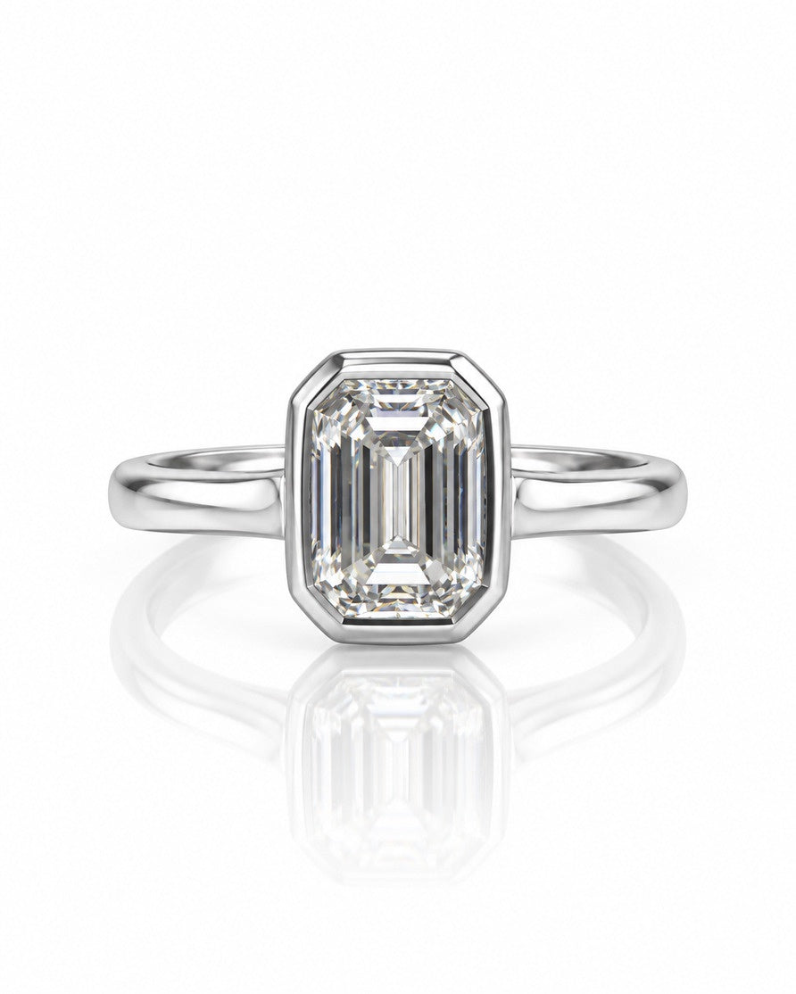 9ct white gold bezel solitaire ring with a 1.00ct emerald cut lab-grown diamond