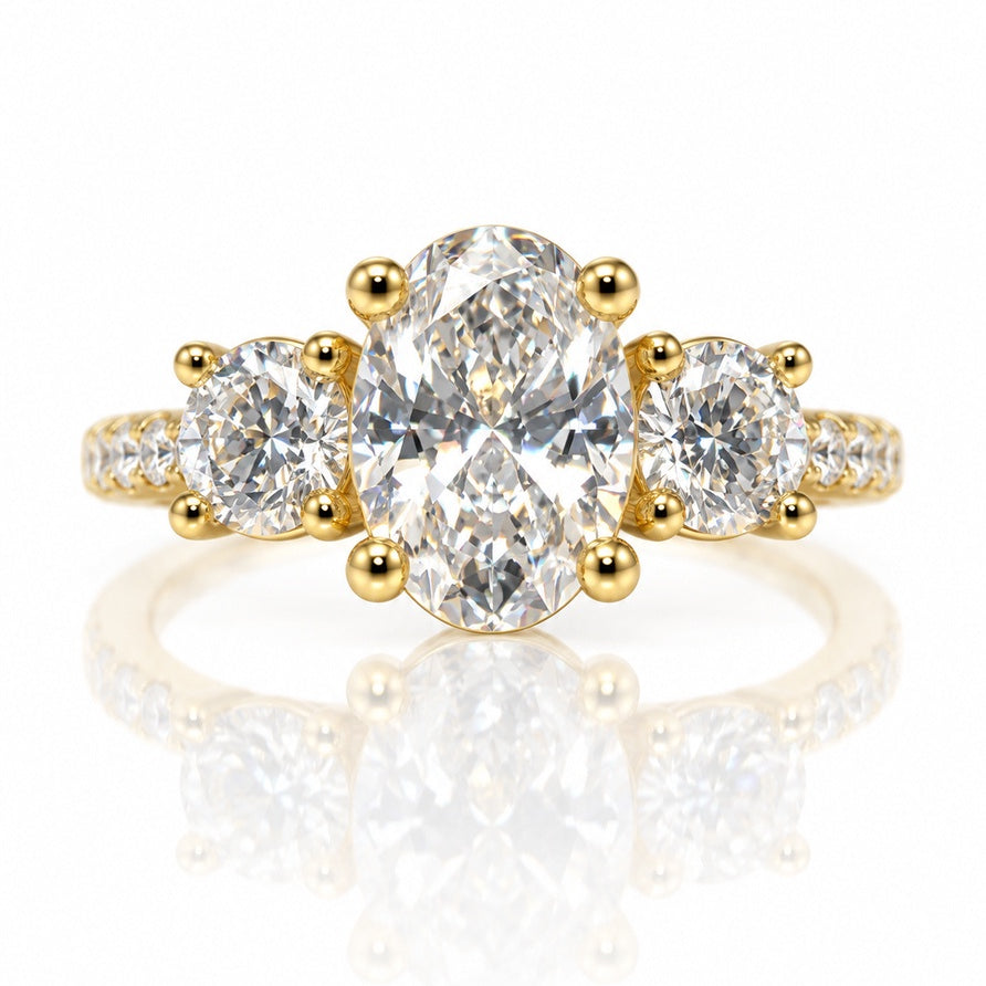 9ct yellow gold trilogy ring with oval lab-grown diamond centre and two round side stones