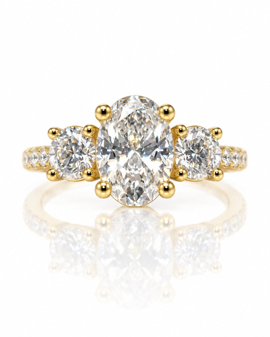 9ct yellow gold trilogy ring with oval lab-grown diamond centre and two round side stones