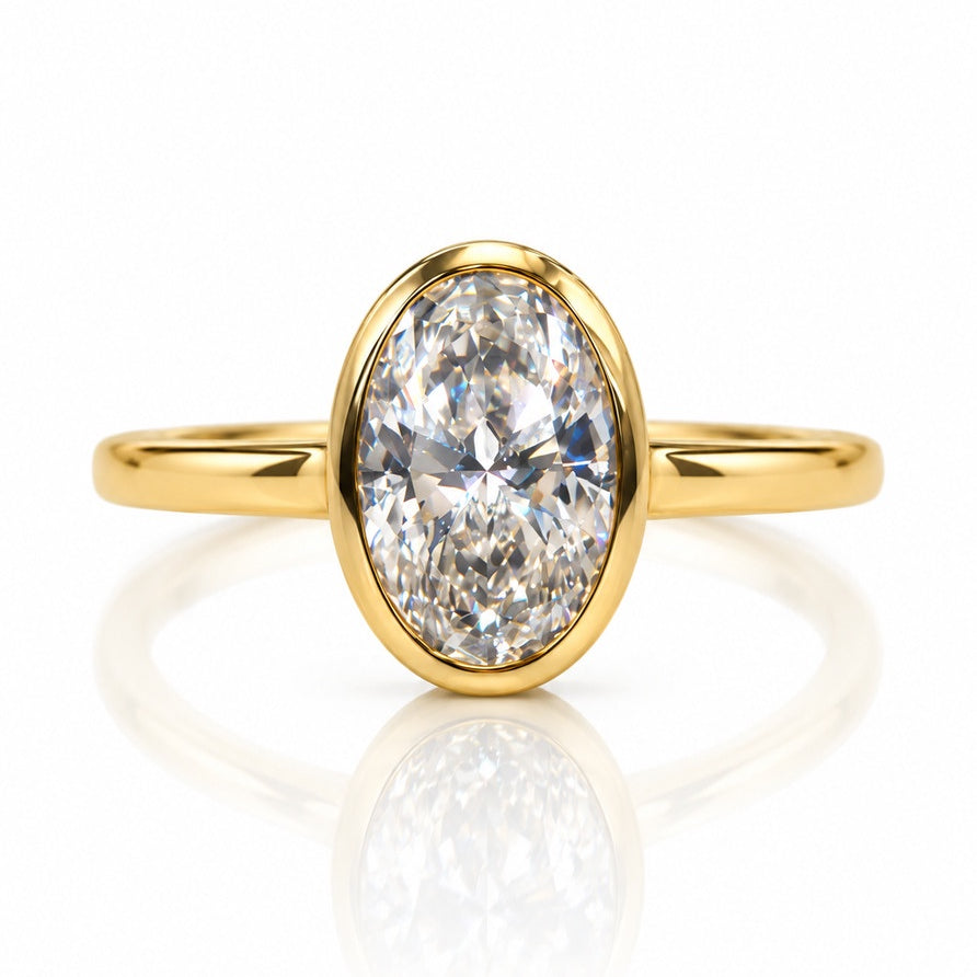 9ct yellow gold engagement ring with bezel-set 1.05ct oval lab-grown diamond and slim polished band