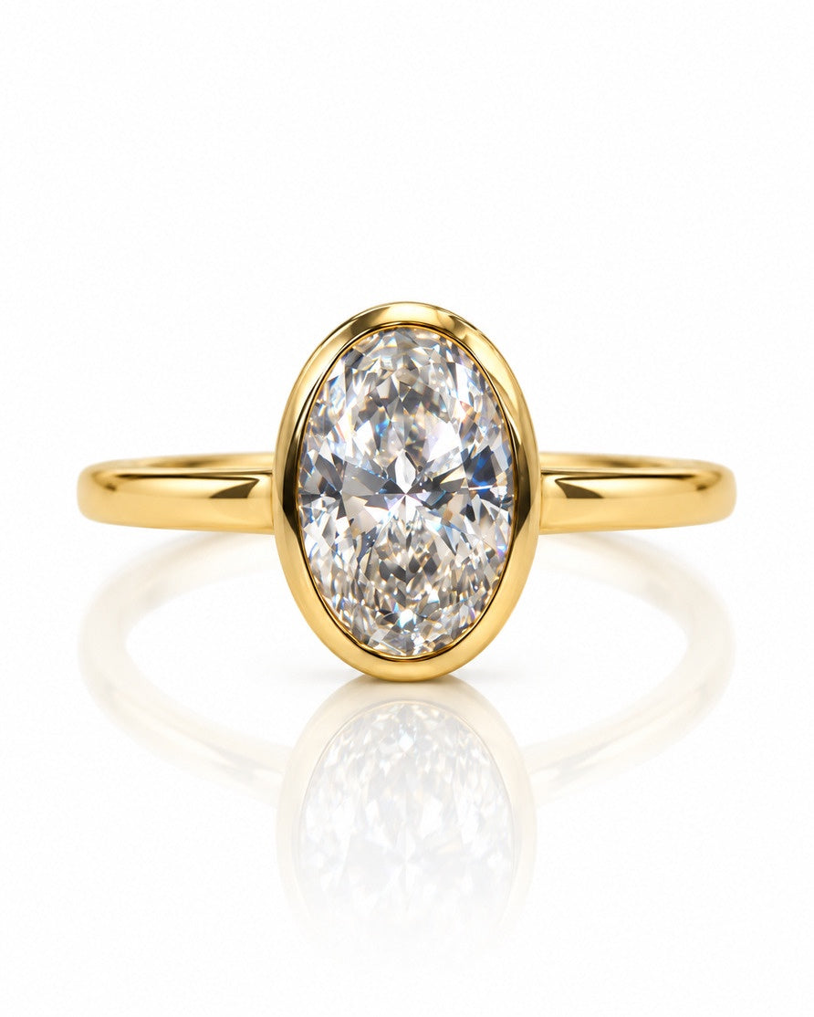 9ct yellow gold engagement ring with bezel-set 1.05ct oval lab-grown diamond and slim polished band