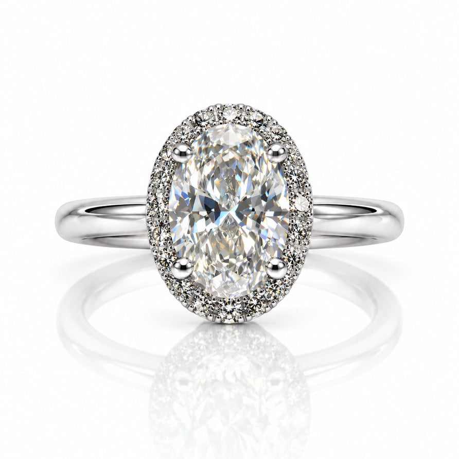 9ct white gold oval halo engagement ring with pavé diamonds and four claws on a slim polished band