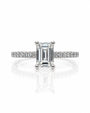 9ct white gold hidden halo ring with emerald cut lab-grown diamond and pavé-set shoulders