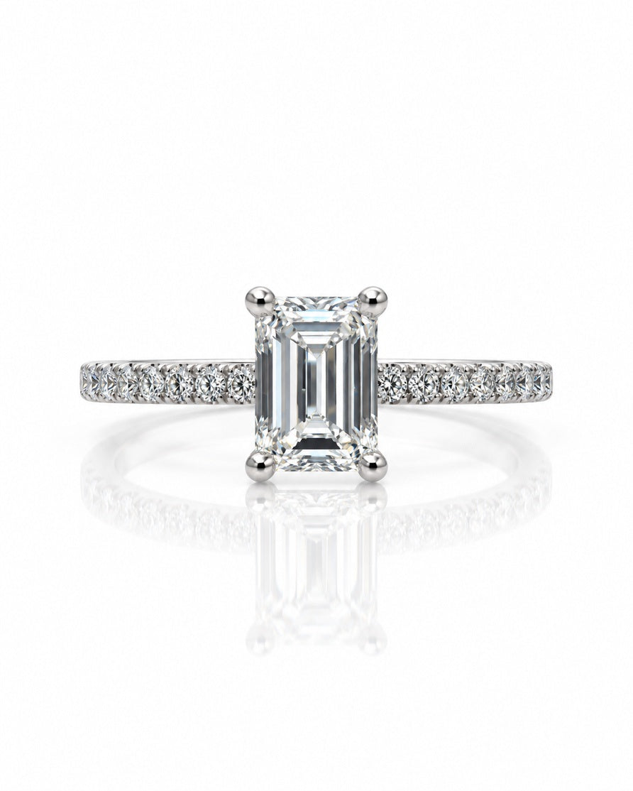 9ct white gold hidden halo ring with emerald cut lab-grown diamond and pavé-set shoulders