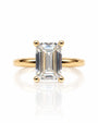 9ct yellow gold solitaire ring with emerald cut lab-grown diamond in four ball-tipped claws