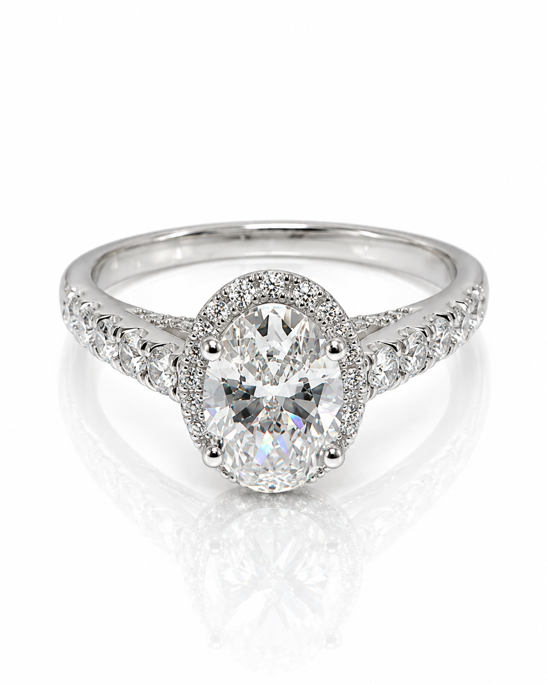 9ct white gold oval lab grown diamond halo engagement ring with pavé shoulders from Cassims & Co.