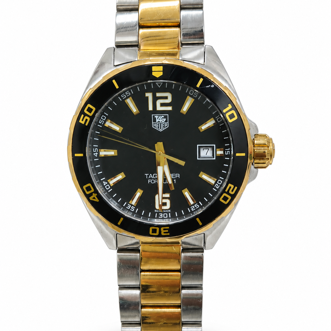 TAG Heuer Formula 1 WAZ1121 black dial with gold-tone luminous markers and date window