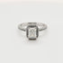 1.00ct emerald cut moissanite halo engagement ring in sterling silver with pavé band by Cassim & Co.