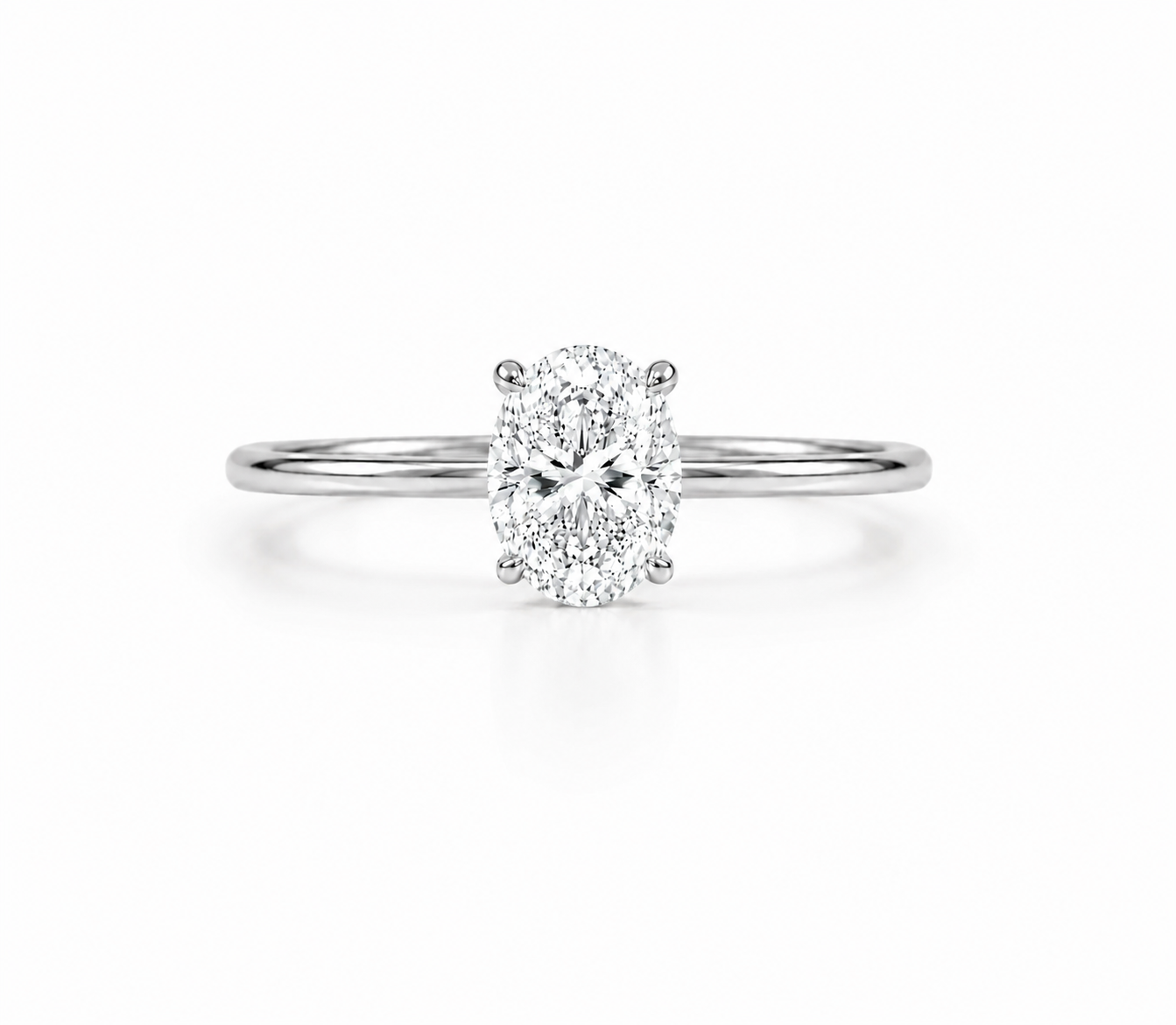 9ct white gold 1.5ct oval lab grown diamond solitaire engagement ring with four claw setting on plain polished band