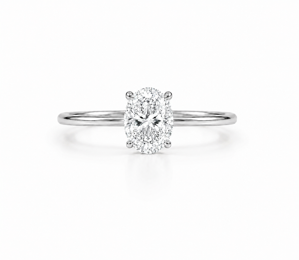 9ct white gold 1.5ct oval lab grown diamond solitaire engagement ring with four claw setting on plain polished band