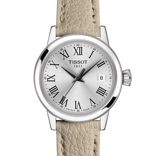 Tissot Classic Dream T129.210.11.013.00 ladies quartz watch with 28mm stainless steel case, silver Roman numeral dial, date window, and beige leather strap