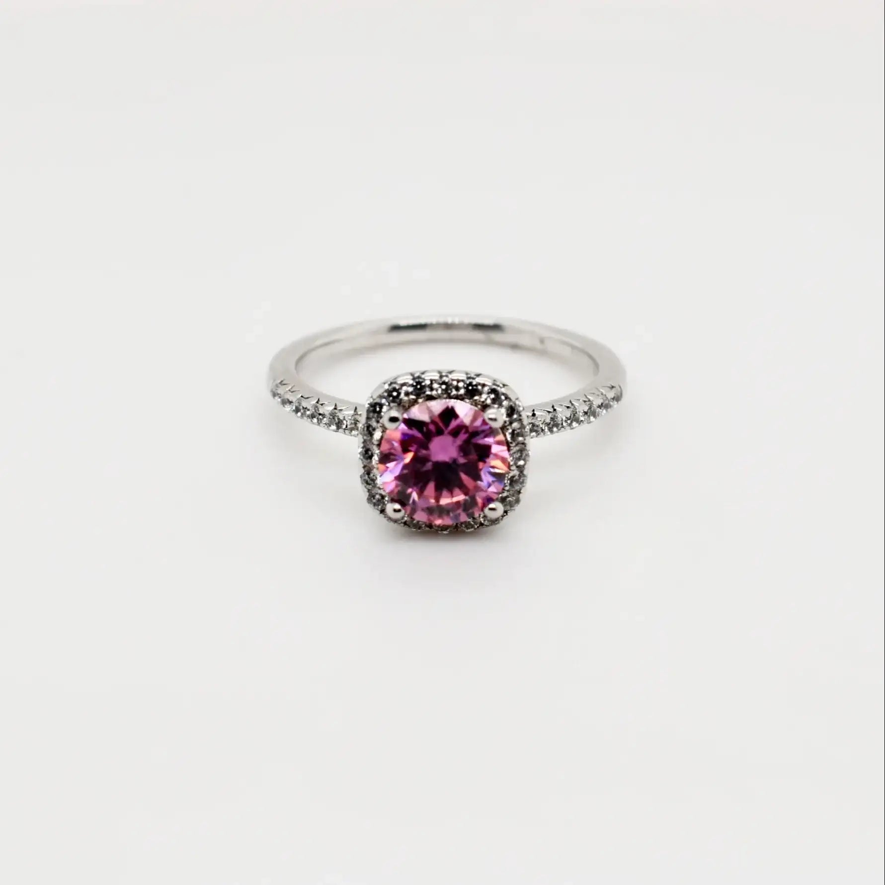 Sterling silver 1ct pink cushion cut moissanite halo engagement ring with pavé band by Cassim & Co. Johannesburg
