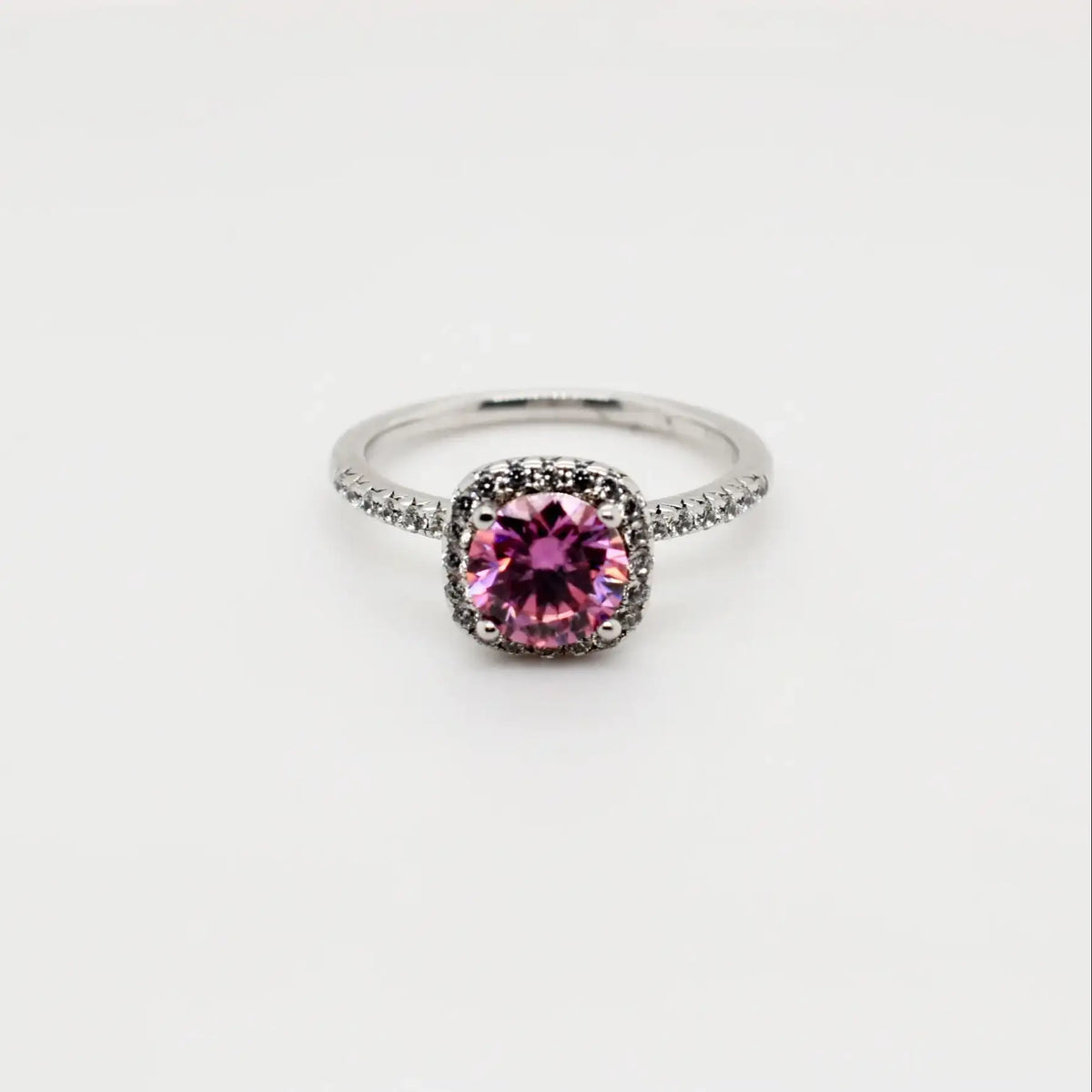 Sterling silver 1ct pink cushion cut moissanite halo engagement ring with pavé band by Cassim & Co. Johannesburg