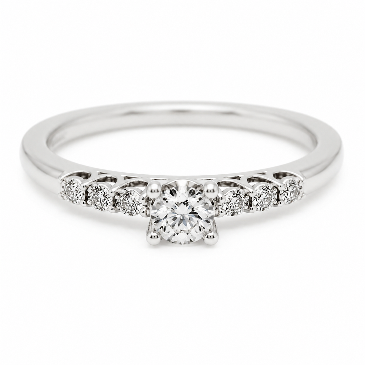 9ct white gold diamond engagement ring with round brilliant centre stone and shoulder diamonds in double claw setting