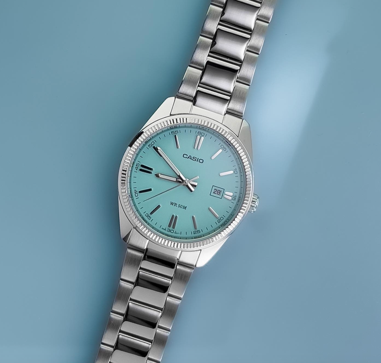 Casio MTP-1302PD Quartz Turquoise Blue Dial Stainless Steel Watch (MTP-1302PD-2A2VDF)