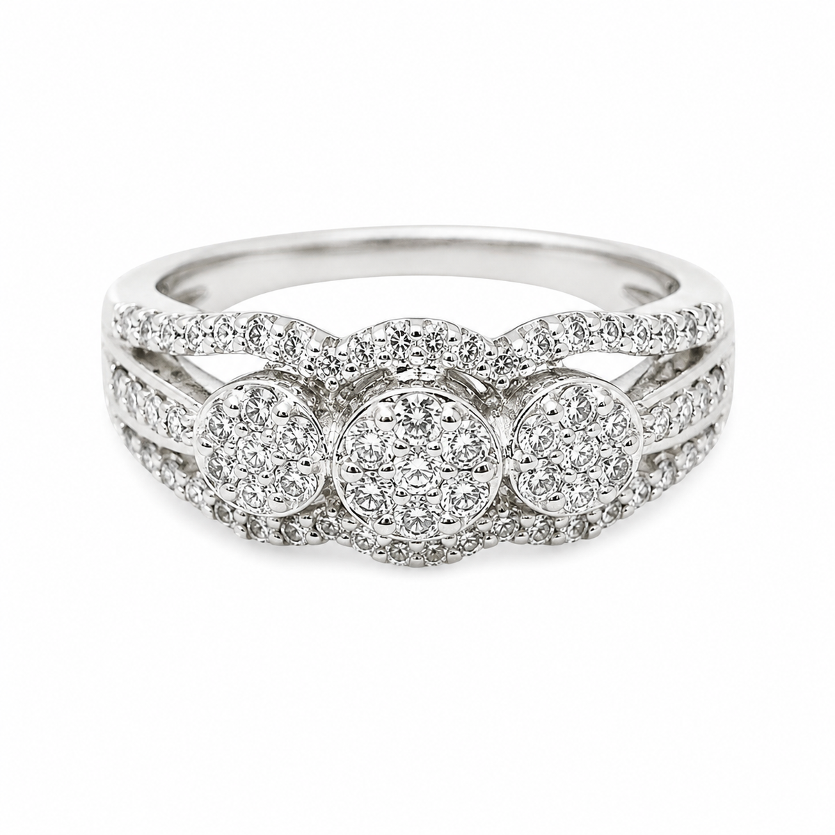 9ct white gold diamond cluster engagement ring with three-stone halo design and pavé split shank band from Cassim & Co Johannesburg