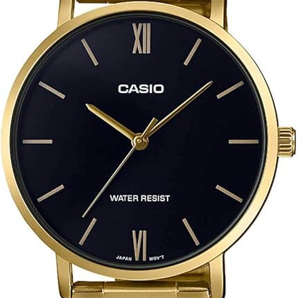 Casio MTP-VT01G-1B quartz dress watch with black dial, Roman numerals, and gold-tone stainless steel case and bracelet