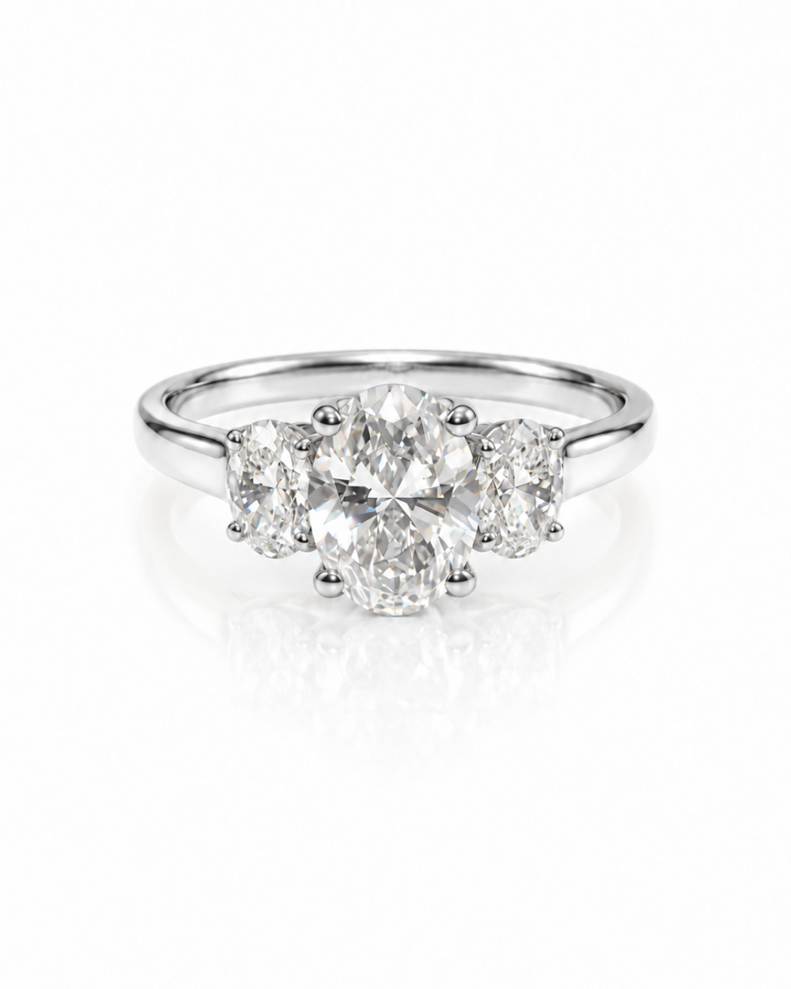 9ct white gold three stone engagement ring featuring 1.50ct oval lab grown diamond with two oval side stones in claw setting