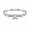 9ct white gold diamond engagement ring with round brilliant centre stone in 4-claw setting and pavé diamond band by Cassim & Co
