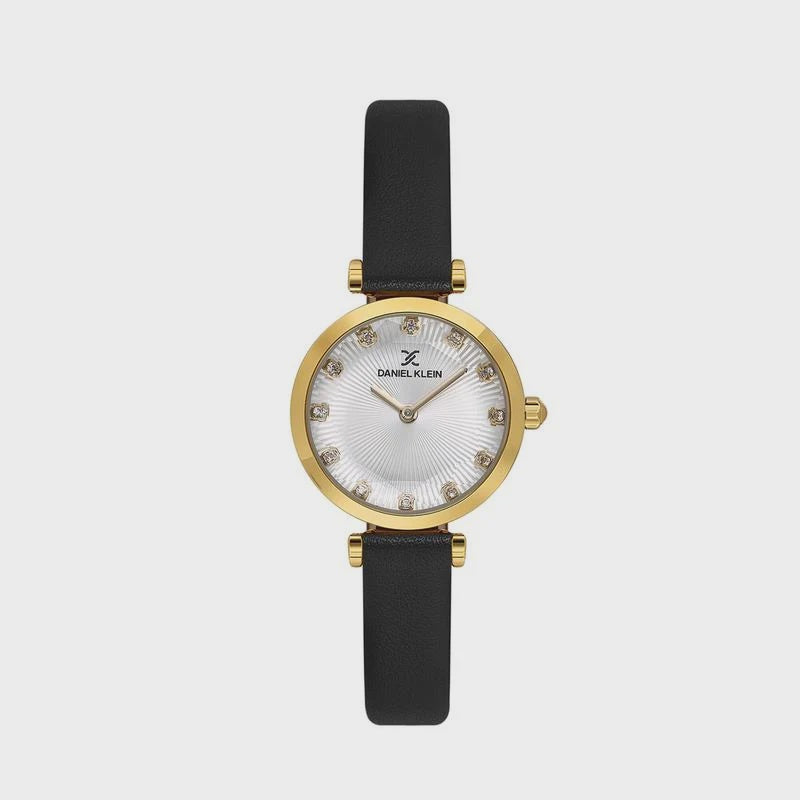 Daniel Klein DK113919-2 ladies quartz watch with gold-tone round case, silver sunray dial with crystal hour markers, and black leather strap