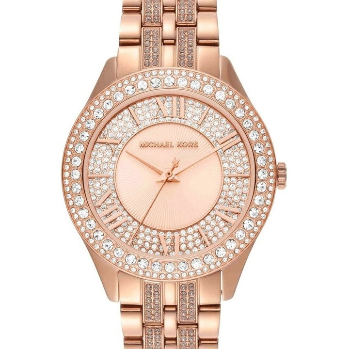 Michael Kors Harlowe 38mm rose gold-tone quartz watch with pavé crystal bezel, sunray dial with Roman numerals, and stainless steel bracelet with crystal-set centre links